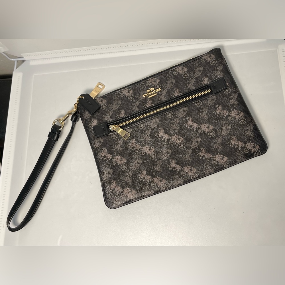 COACH GALLERY POUCH WITH HORSE AND CARRIAGE. No tags, never used.